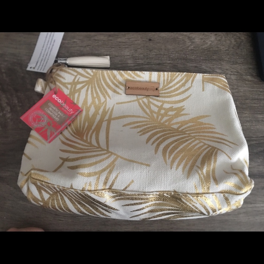 Metallic palm leaf makeup bag